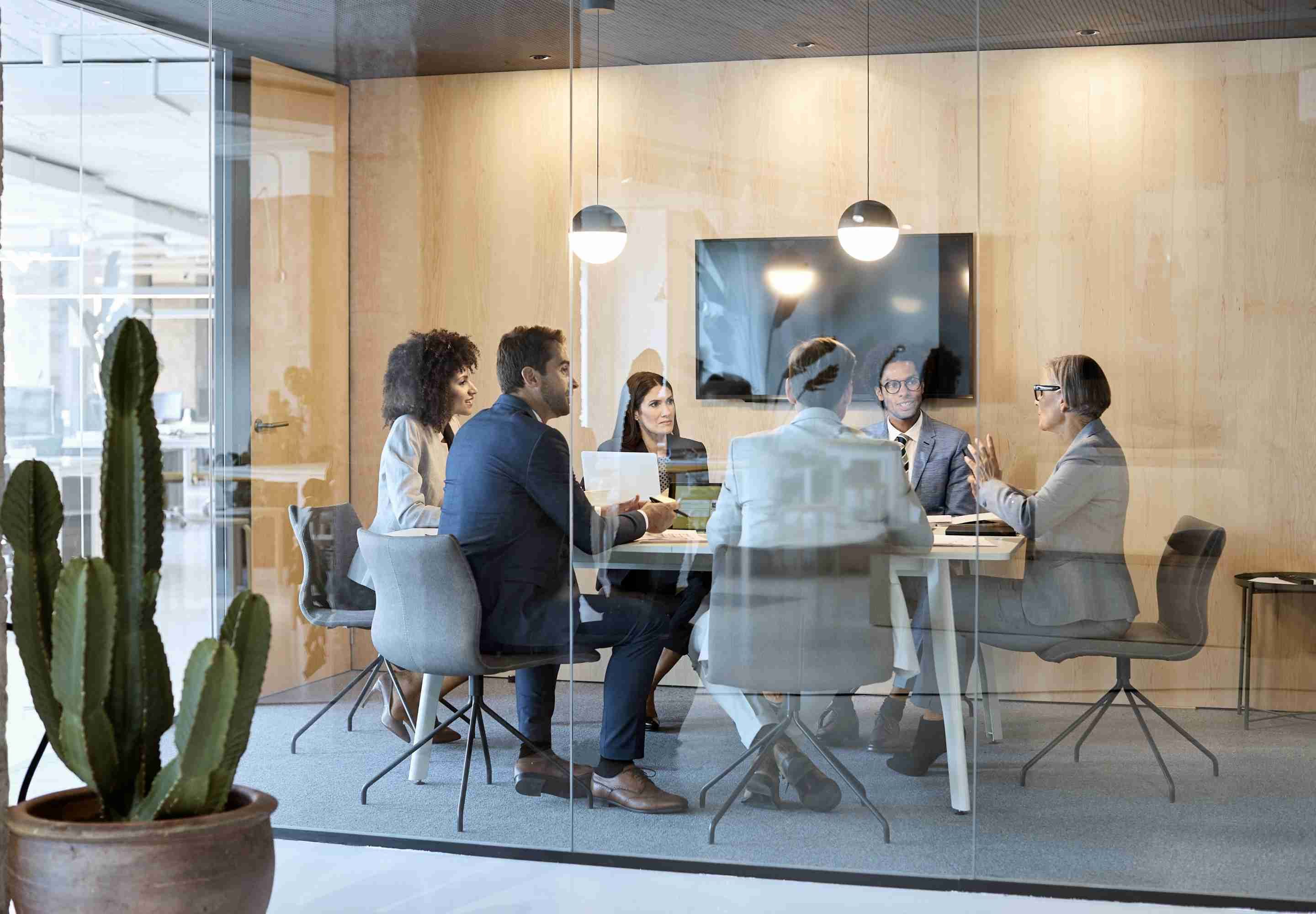 People sitting around a conference table